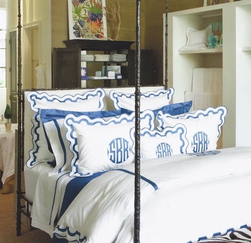 Blue and white pillows and duvet on bed