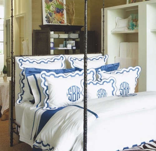 Blue and white pillows and duvet on bed